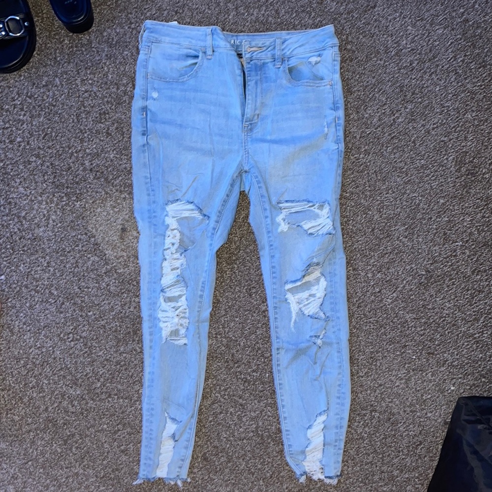 American Eagle ripped blue jeans